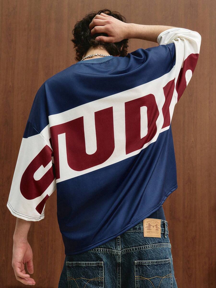 Camiseta suelta de hombro caído con estampado de letras casual para hombre