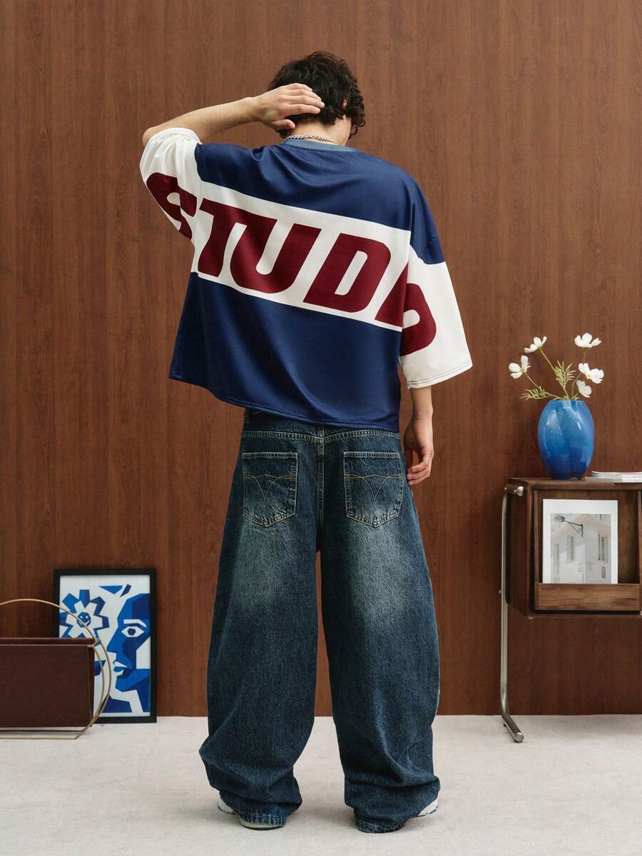 Camiseta suelta de hombro caído con estampado de letras casual para hombre