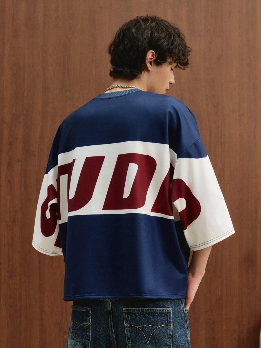 Camiseta suelta de hombro caído con estampado de letras casual para hombre