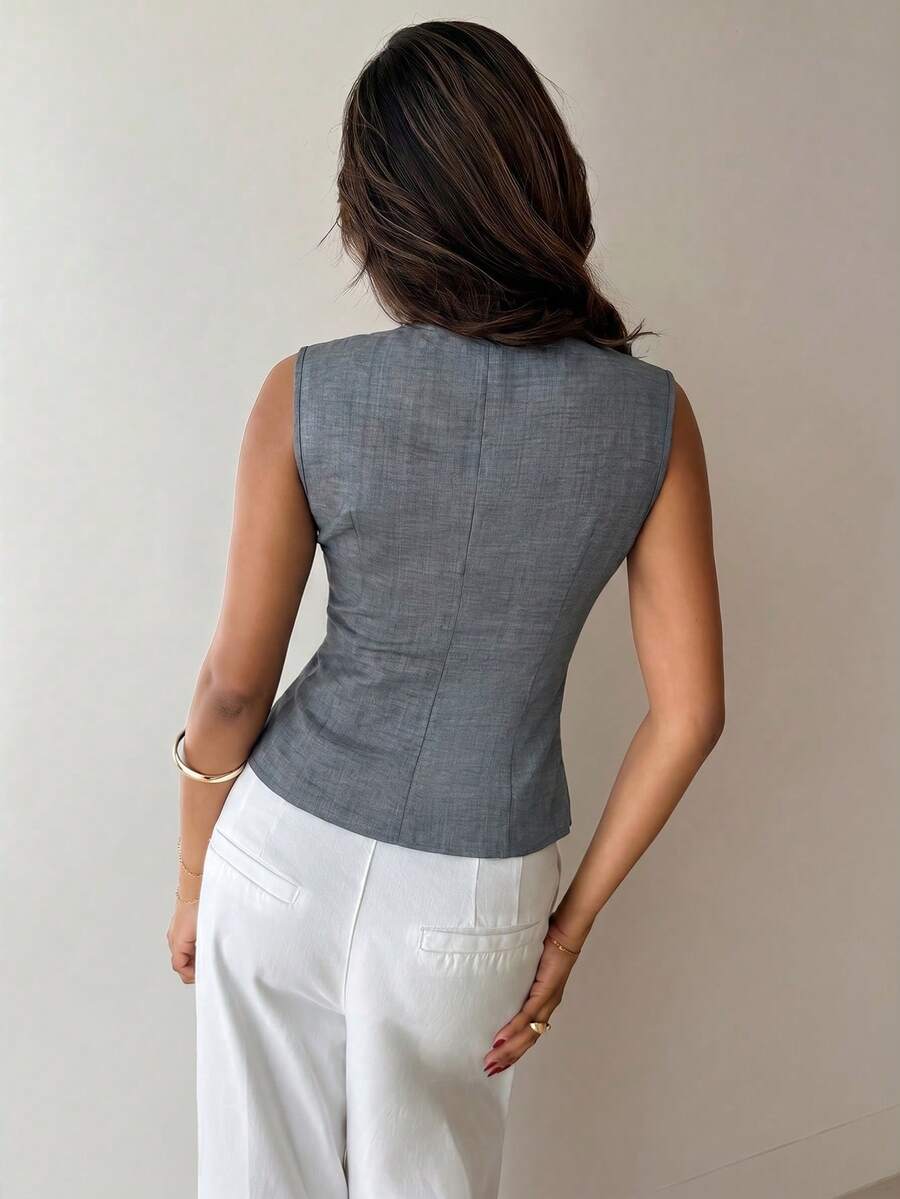 Nueva blusa minimalista de moda con cuello en V asimétrico