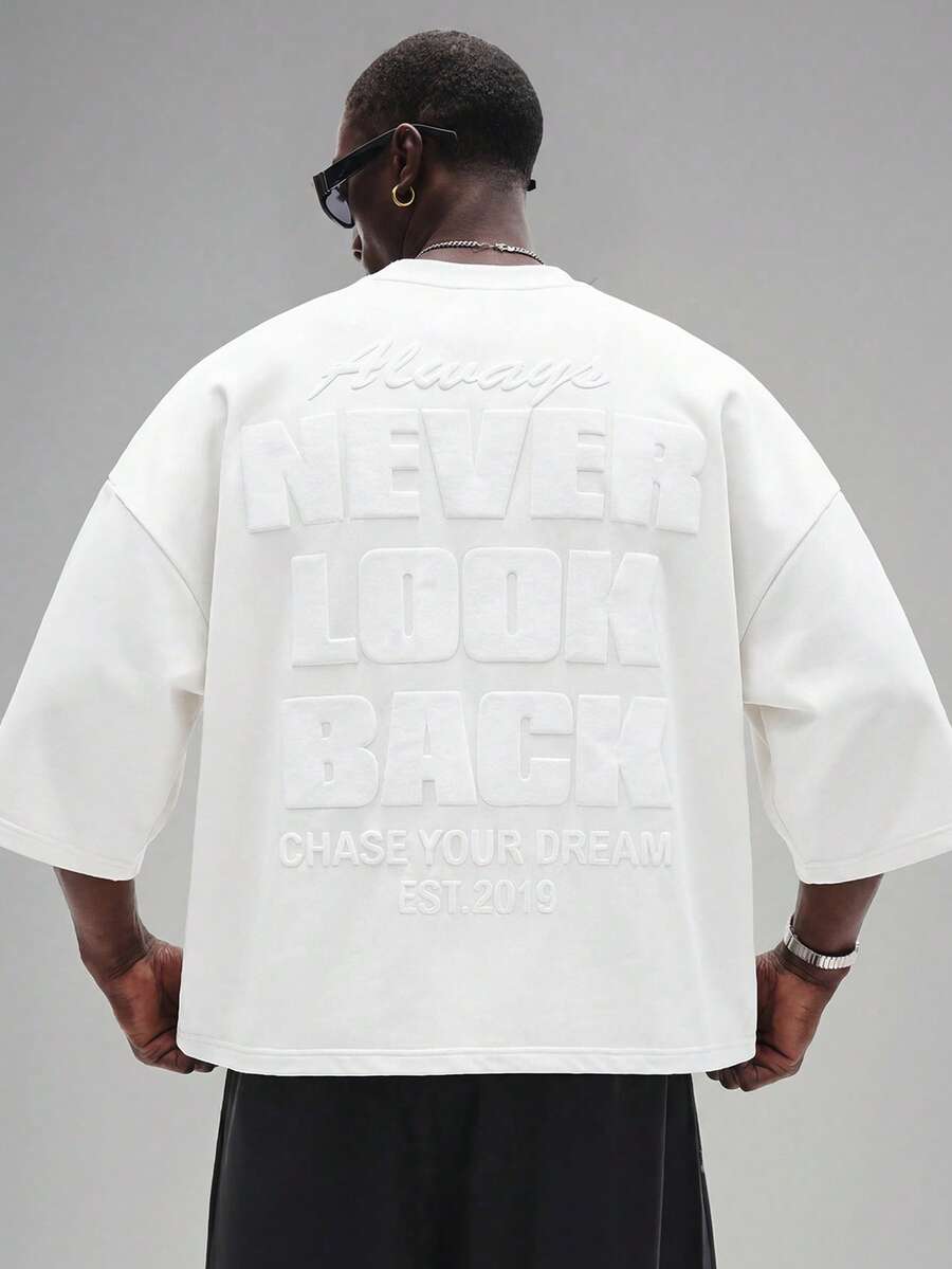 Camiseta suelta de hombro caído con estampado de letras casual para hombre