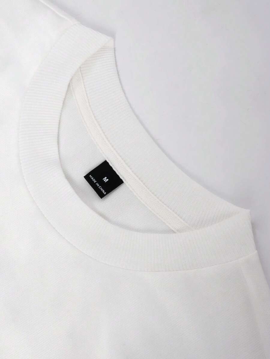 Camiseta suelta de hombro caído con estampado de letras casual para hombre
