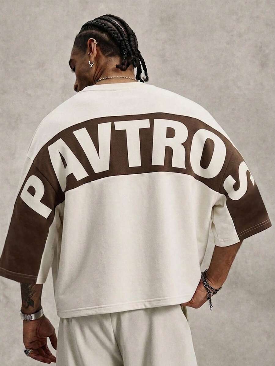 Camiseta suelta de hombro caído con estampado de letras casual para hombre