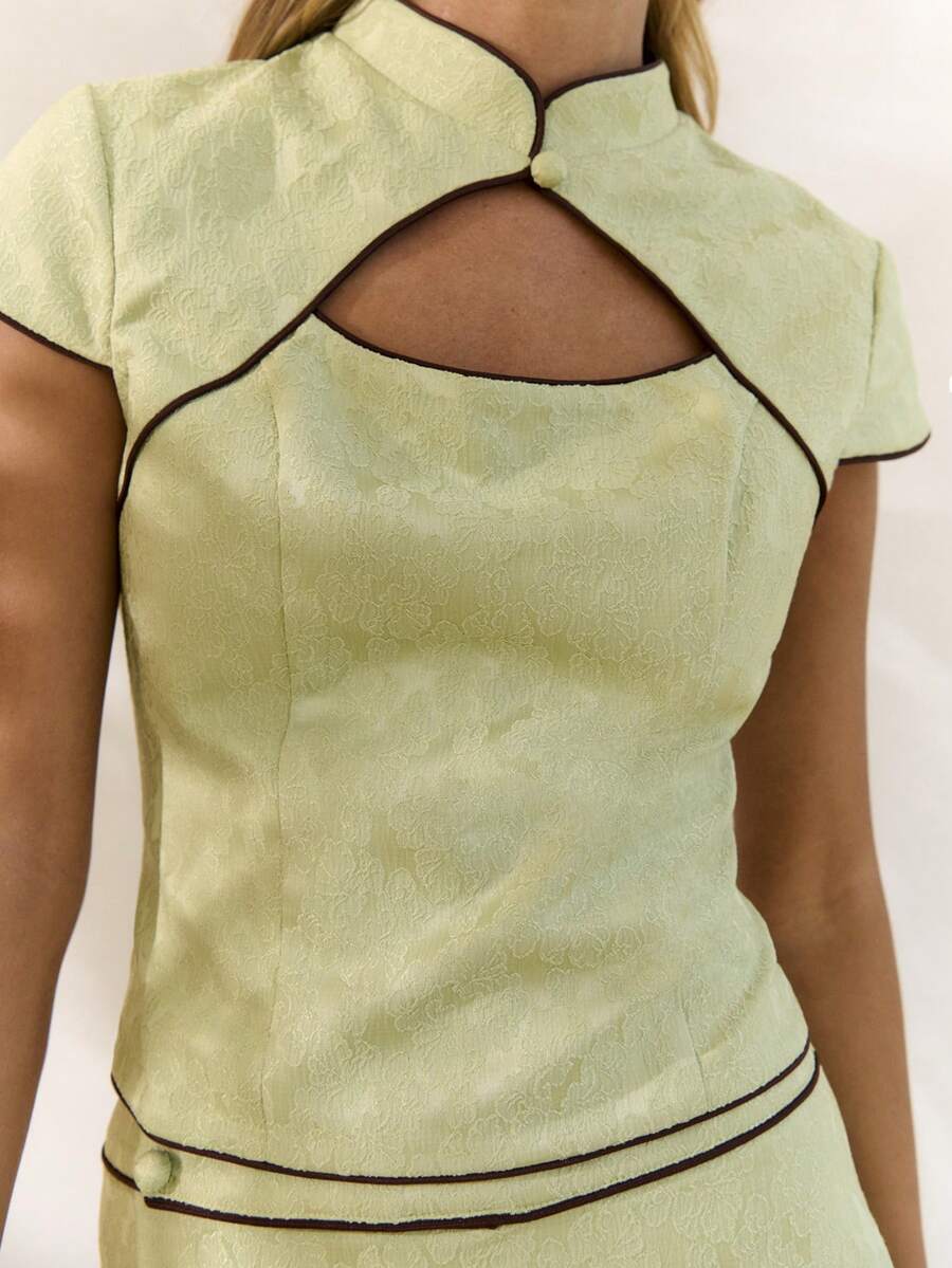 Conjunto de dos piezas con cuello  y falda en línea A