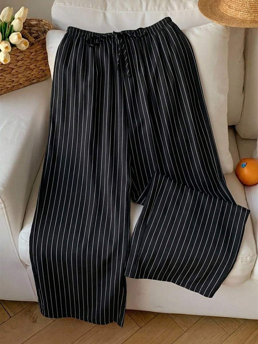 Pantalones casuales con estampado a cuadros para mujer.