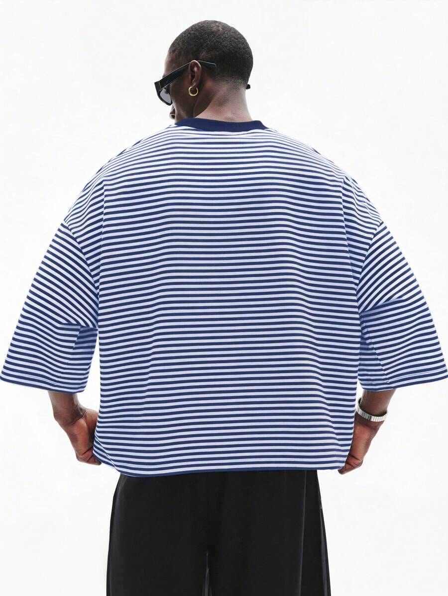 Camiseta suelta de hombro caído con estampado de letras casual para hombre