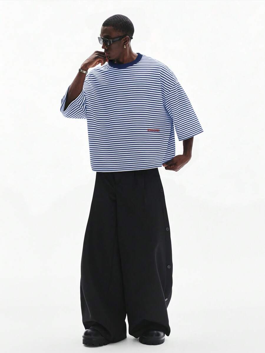 Camiseta suelta de hombro caído con estampado de letras casual para hombre