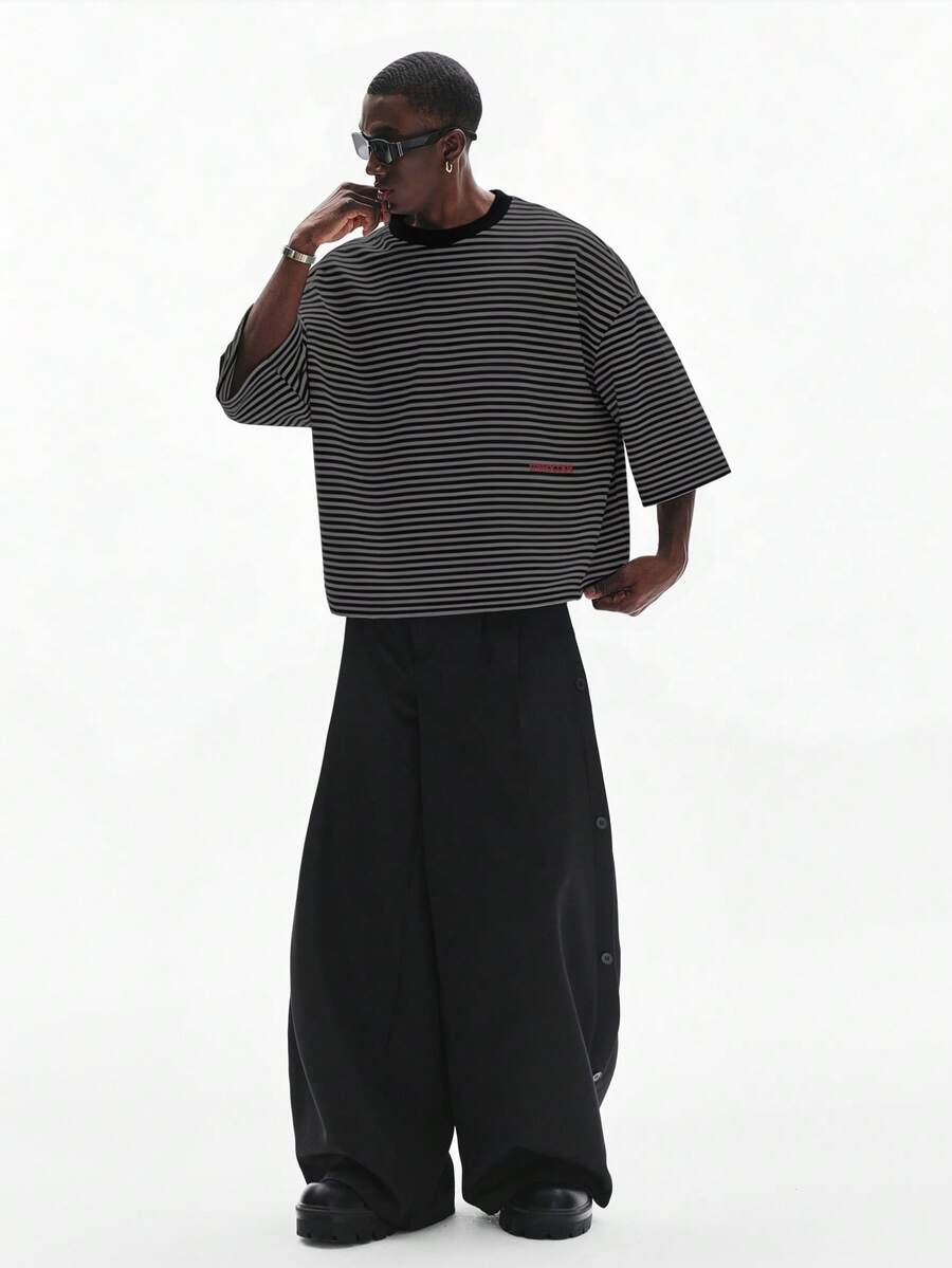 Camiseta suelta de hombro caído con estampado de letras casual para hombre