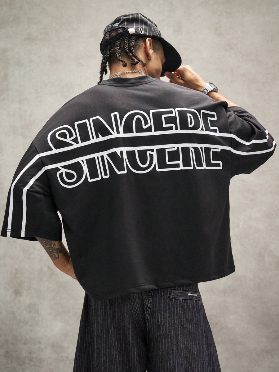 Camiseta suelta de hombro caído con estampado de letras casual para hombre