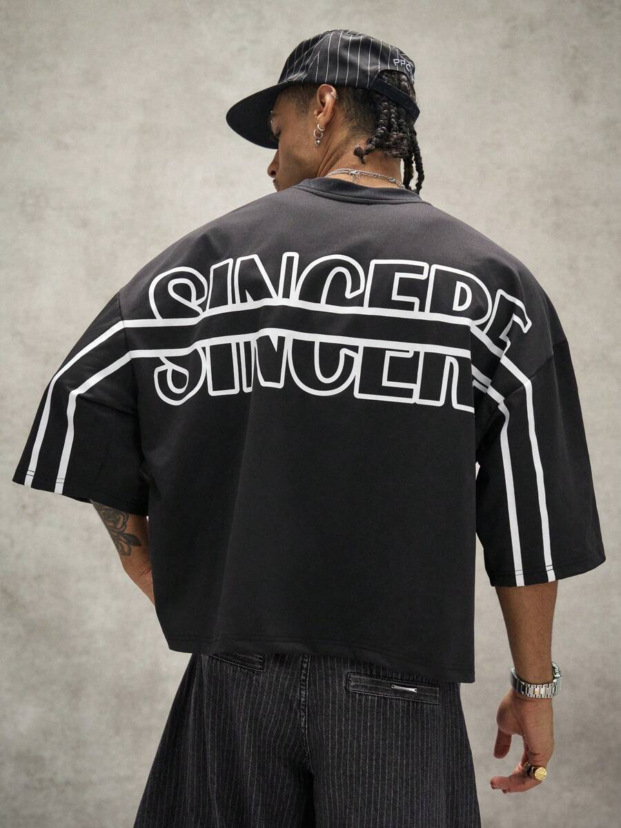 Camiseta suelta de hombro caído con estampado de letras casual para hombre