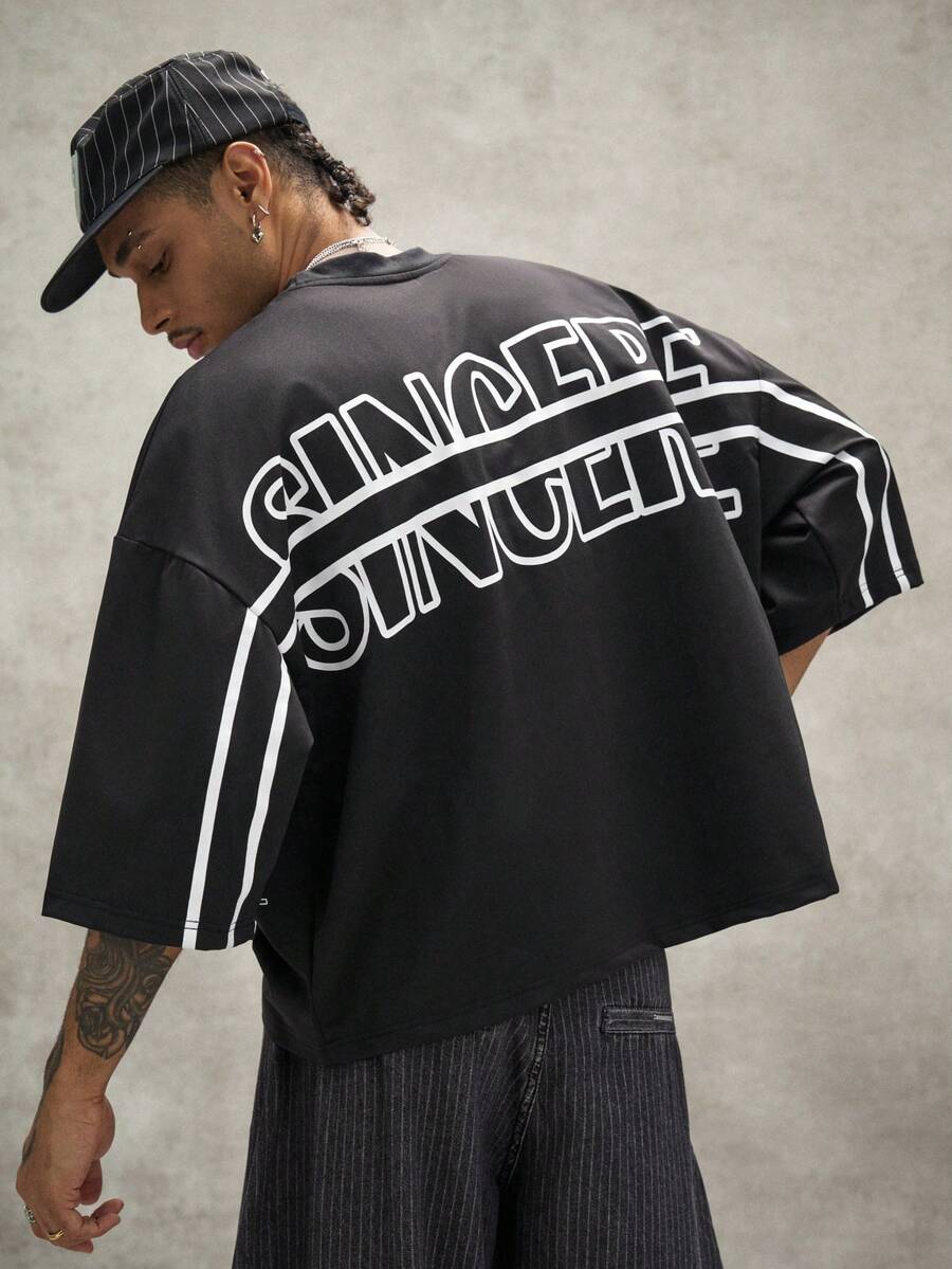 Camiseta suelta de hombro caído con estampado de letras casual para hombre