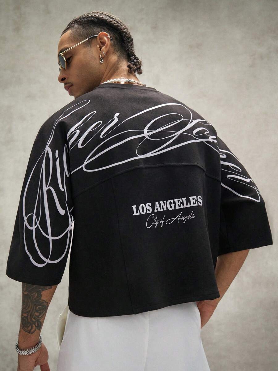 Camiseta suelta de hombro caído con estampado de letras casual para hombre