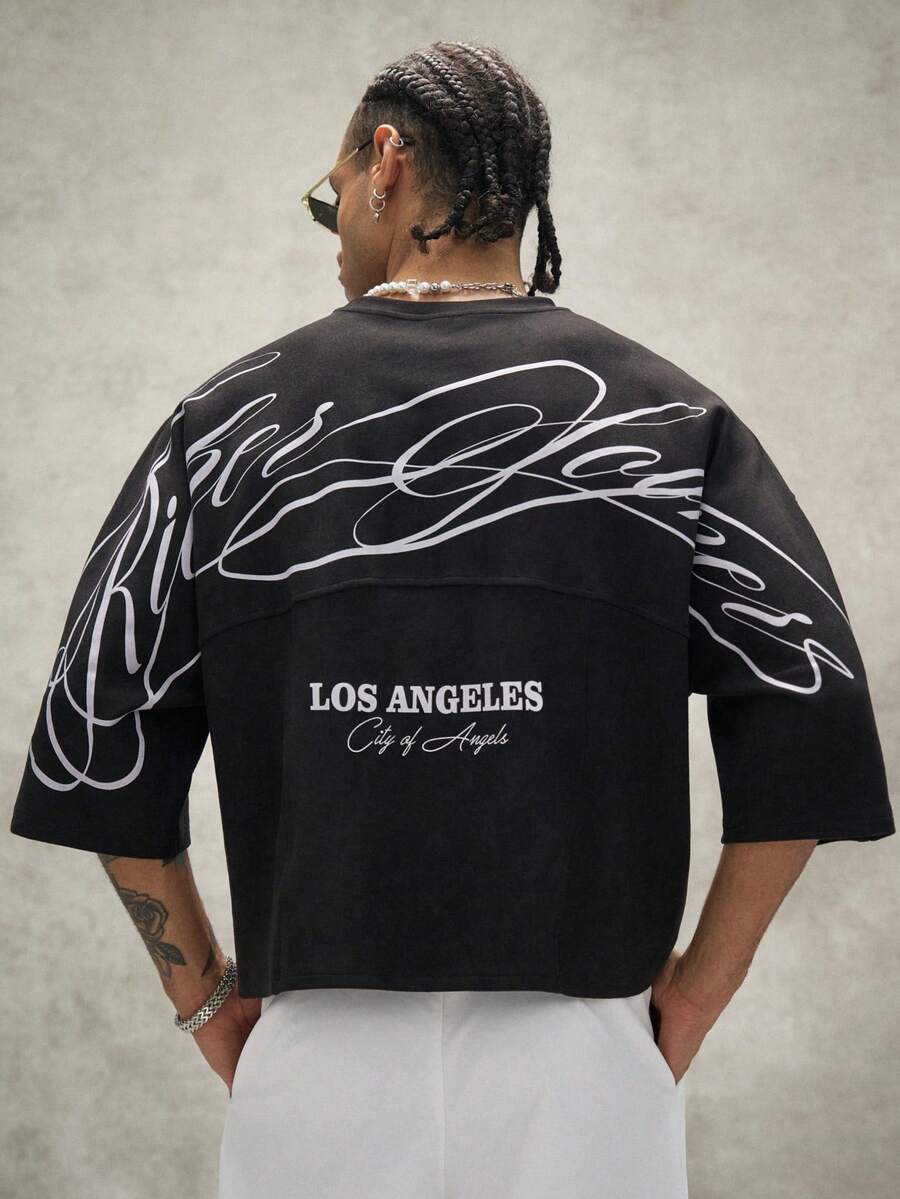 Camiseta suelta de hombro caído con estampado de letras casual para hombre