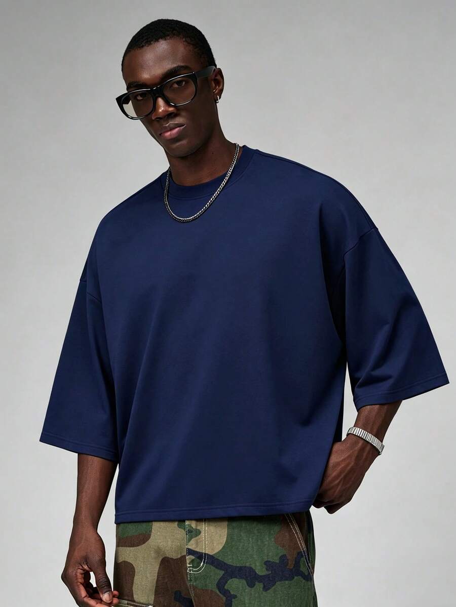 Camiseta suelta de hombro caído con estampado de letras casual para hombre