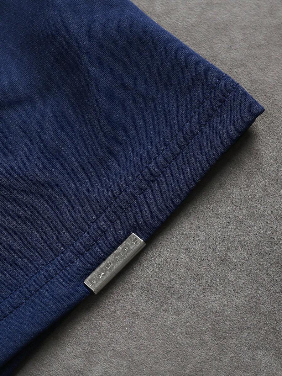 Camiseta suelta de hombro caído con estampado de letras casual para hombre