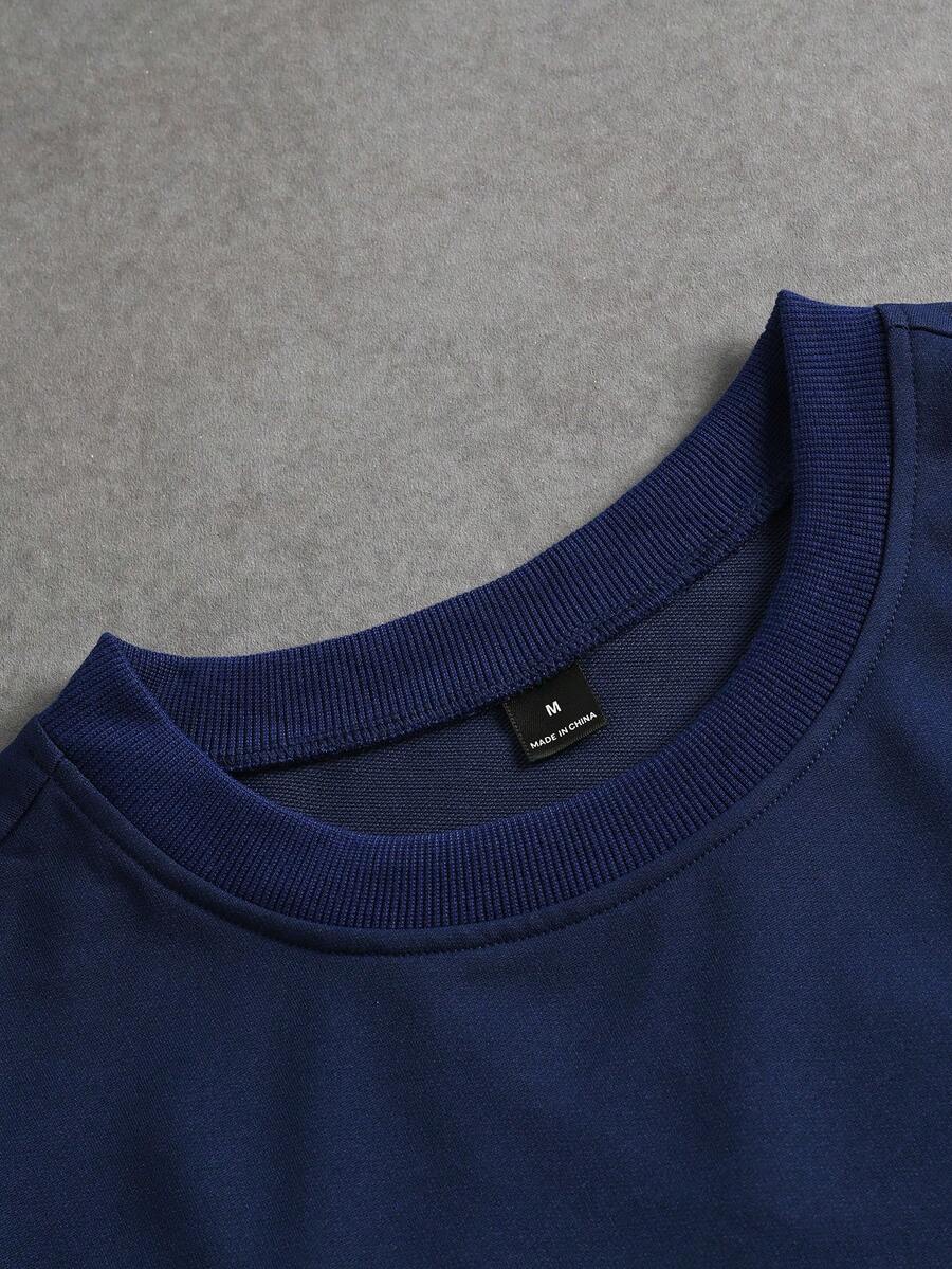 Camiseta suelta de hombro caído con estampado de letras casual para hombre