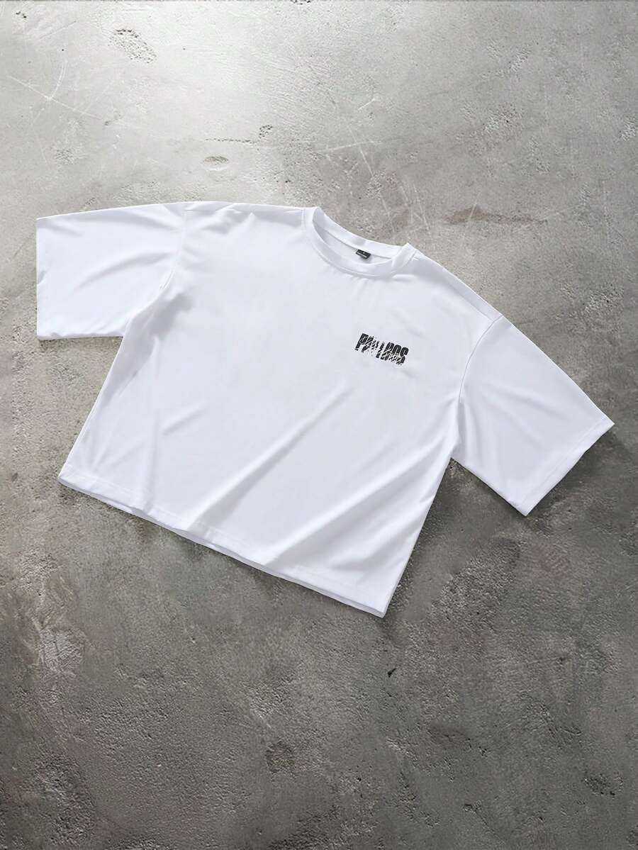 Camiseta suelta de hombro caído con estampado de letras casual para hombre