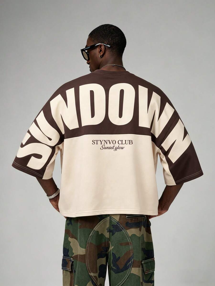 Camiseta suelta de hombro caído con estampado de letras casual para hombre