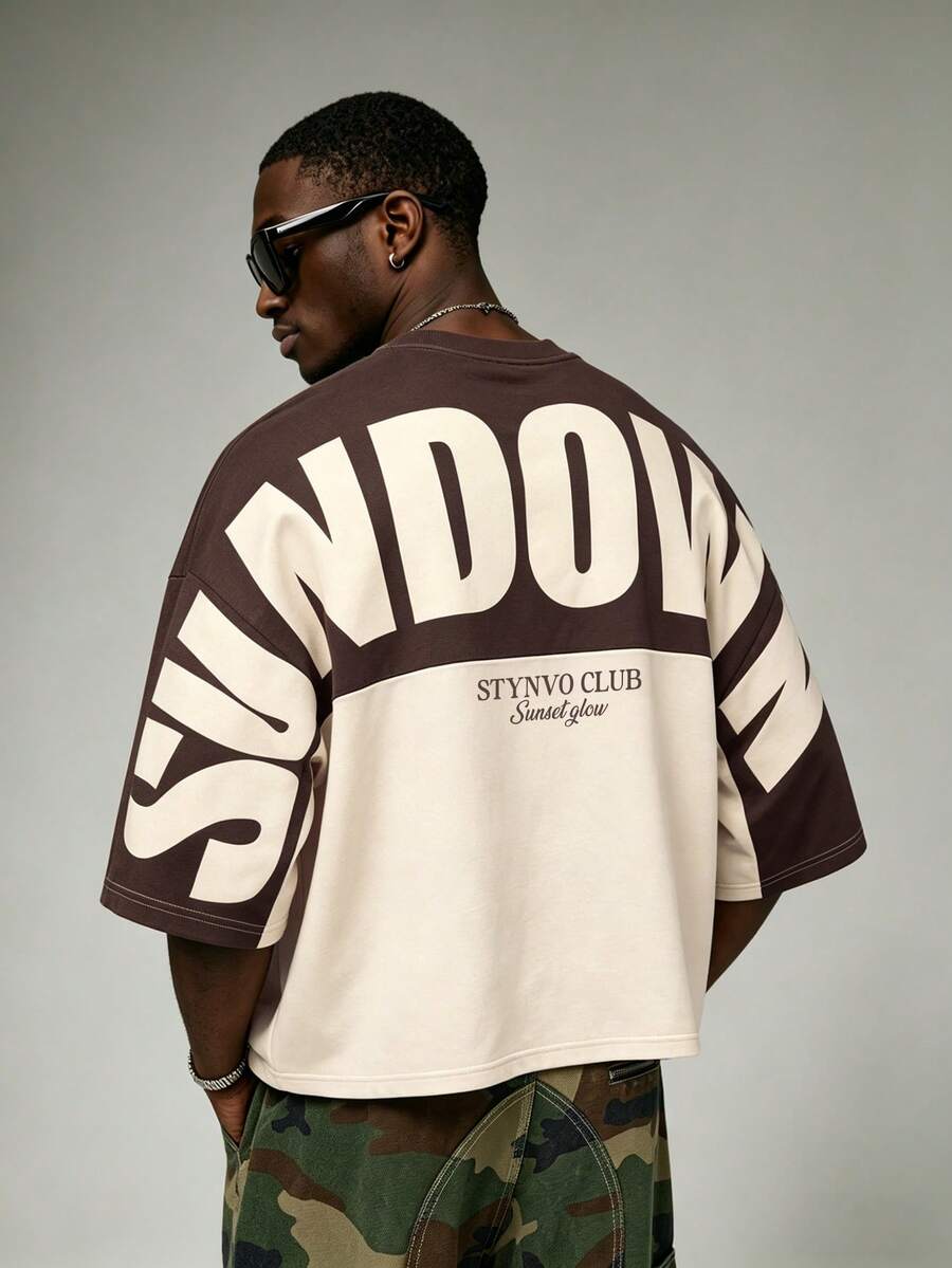 Camiseta suelta de hombro caído con estampado de letras casual para hombre