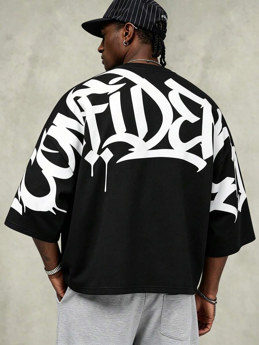 Camiseta suelta de hombro caído con estampado de letras casual para hombre