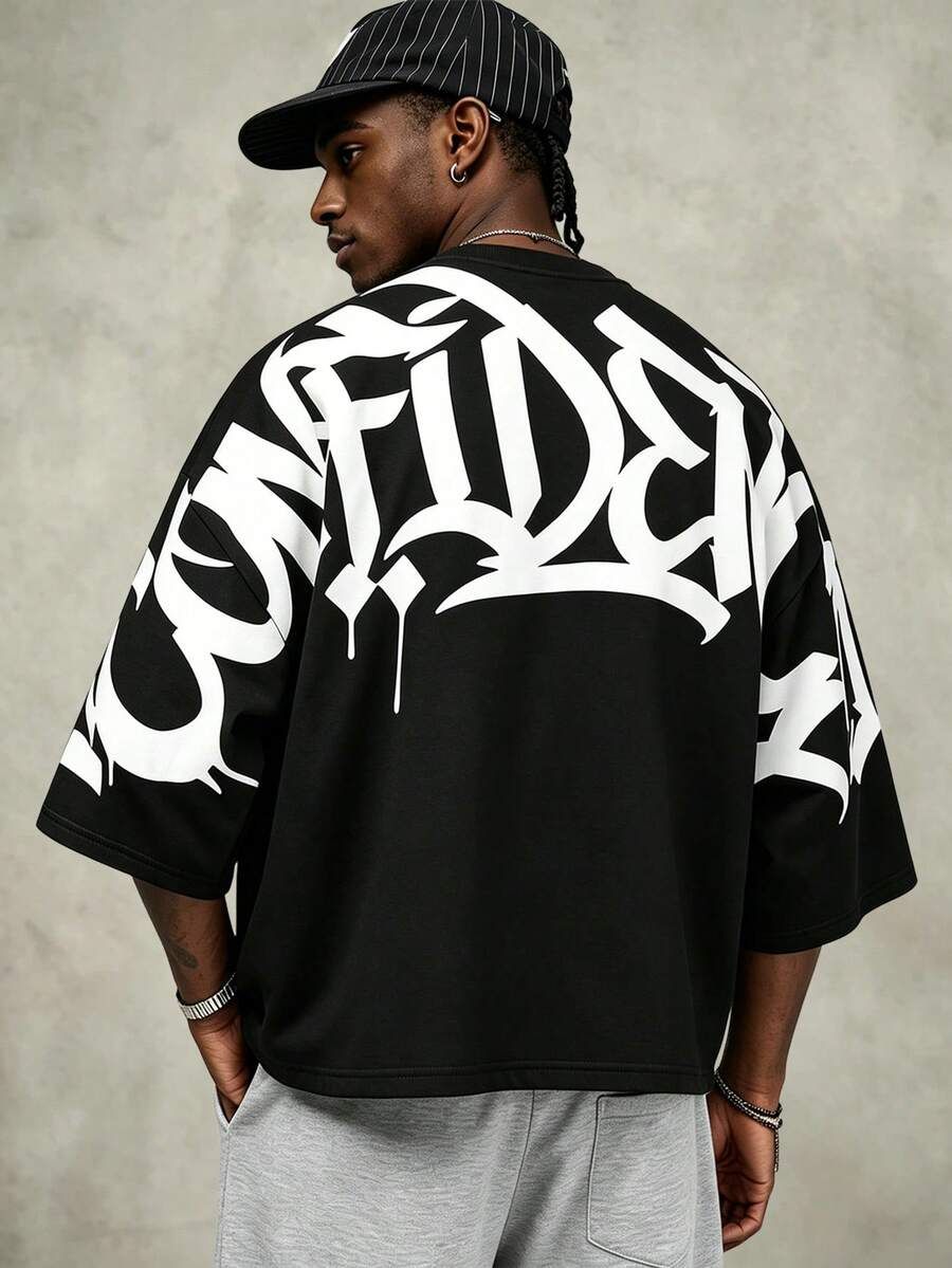 Camiseta suelta de hombro caído con estampado de letras casual para hombre
