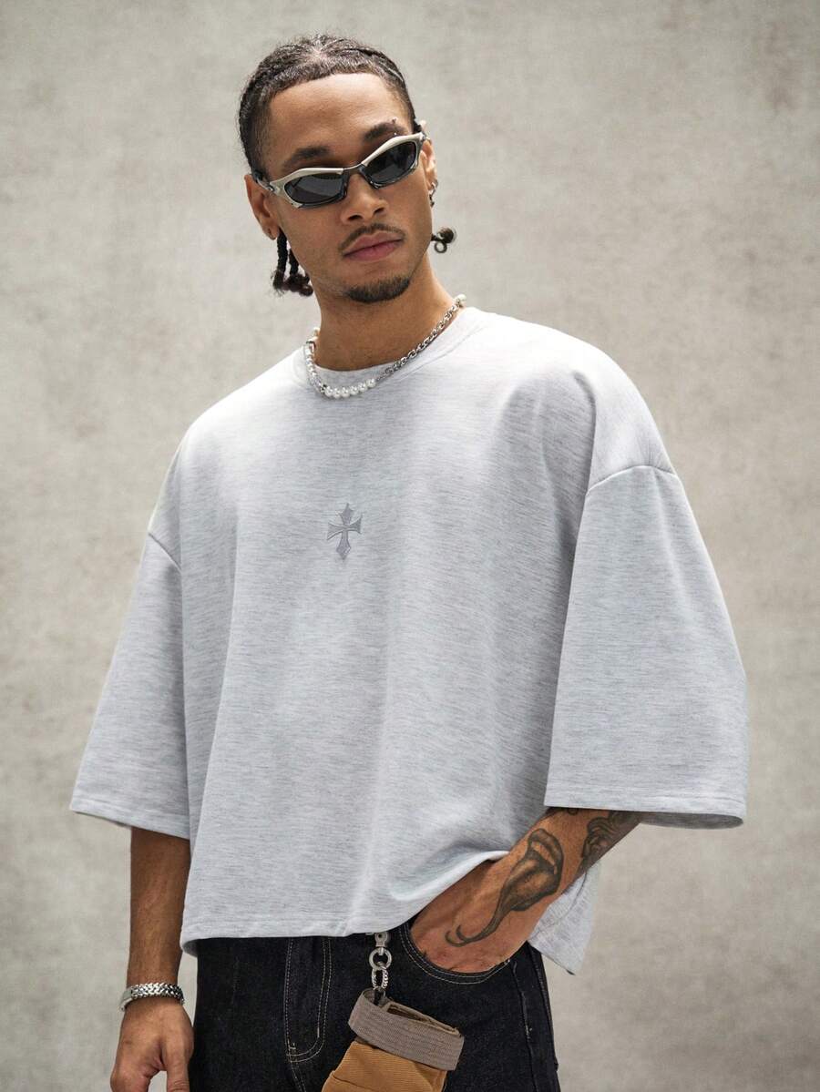Camiseta suelta de hombro caído con estampado de letras casual para hombre