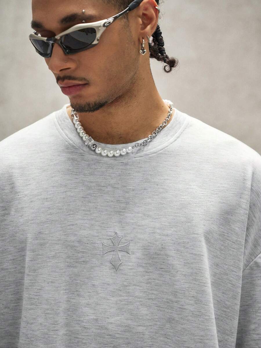 Camiseta suelta de hombro caído con estampado de letras casual para hombre