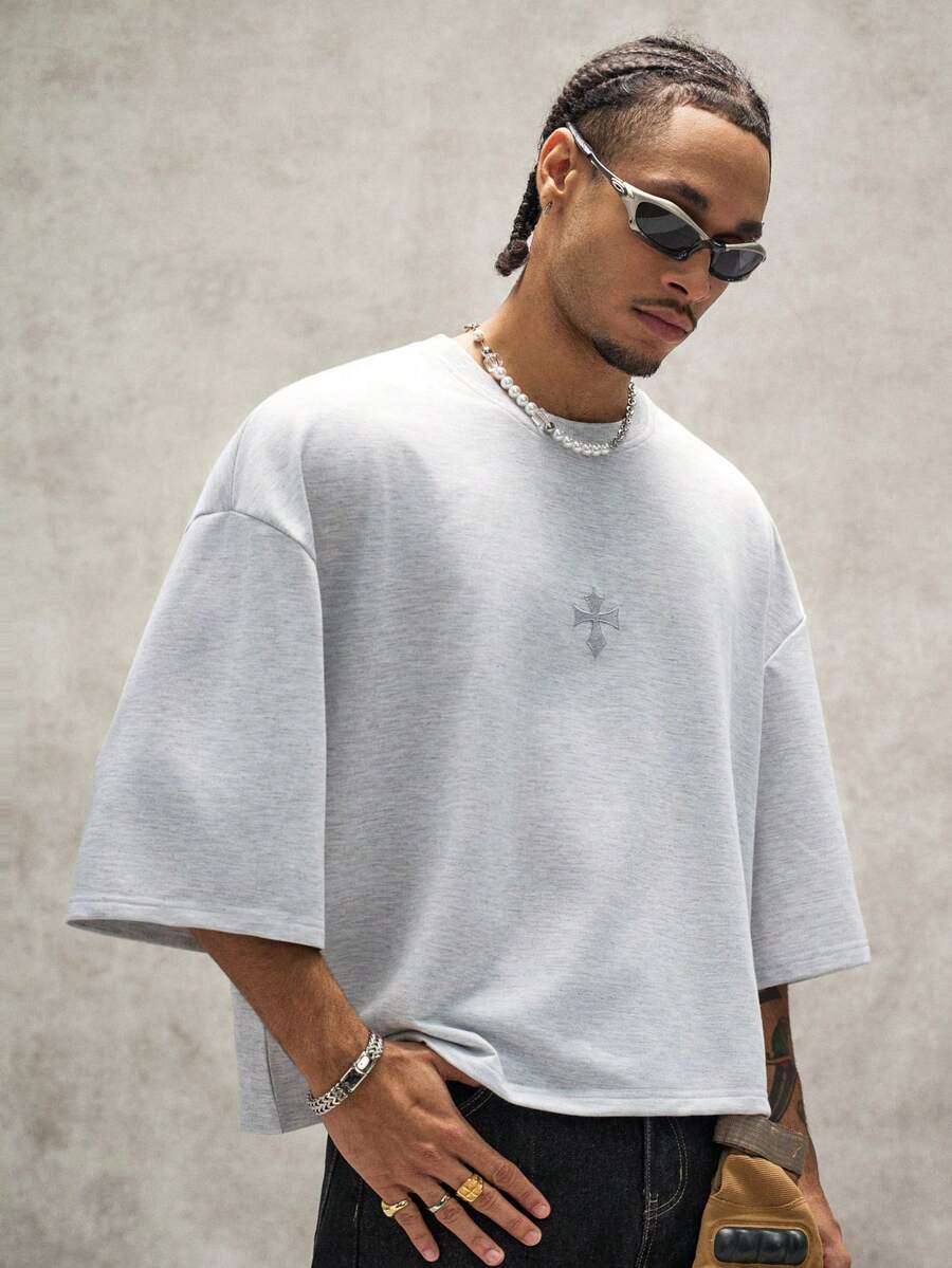 Camiseta suelta de hombro caído con estampado de letras casual para hombre