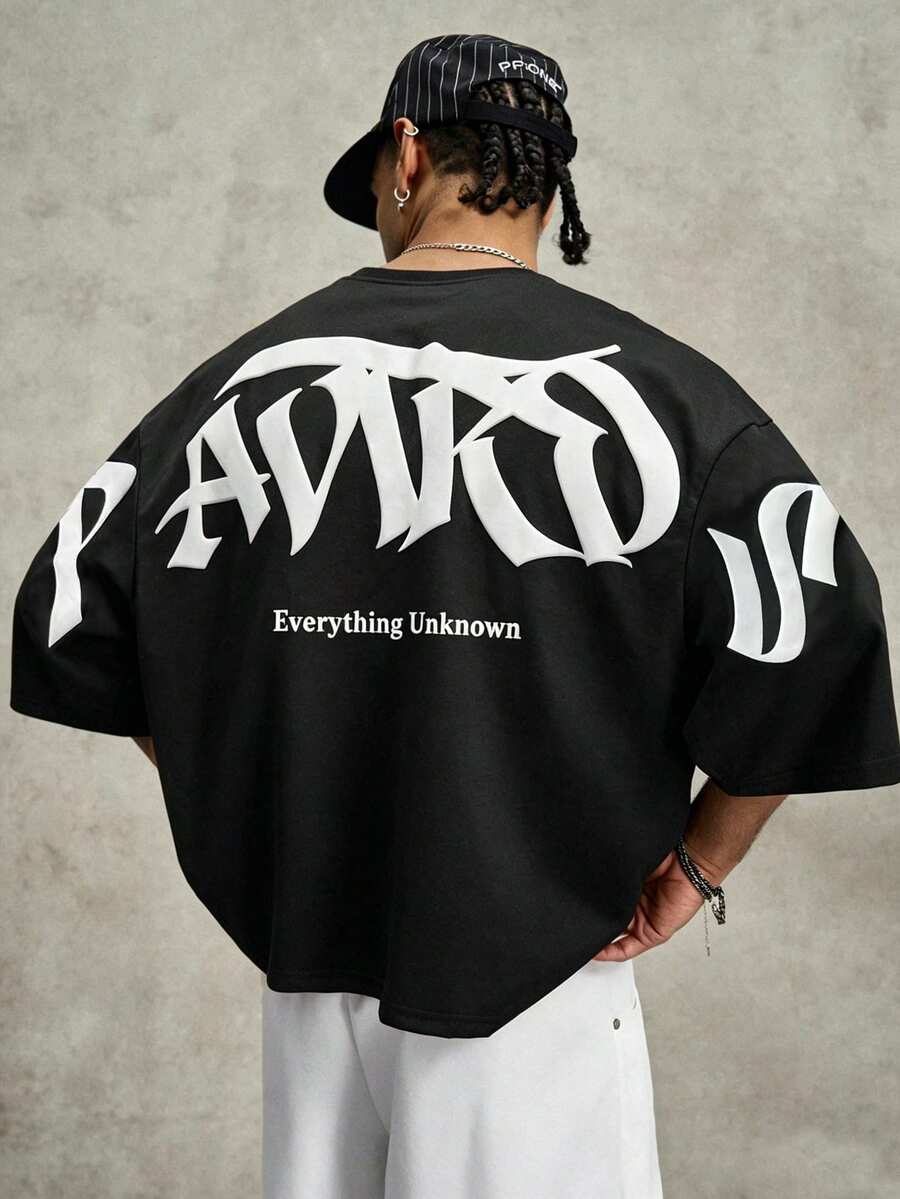 Camiseta suelta de hombro caído con estampado de letras casual para hombre