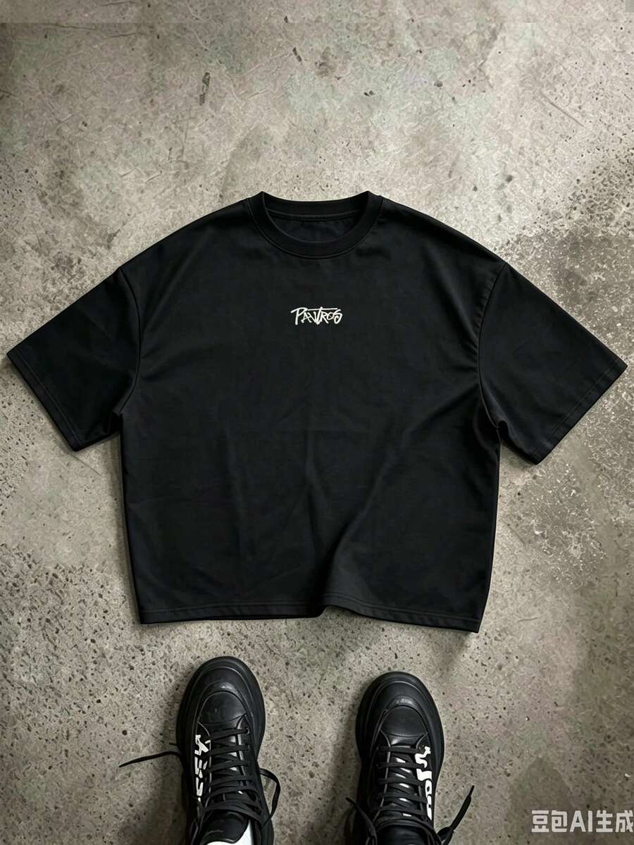 Camiseta suelta de hombro caído con estampado de letras casual para hombre