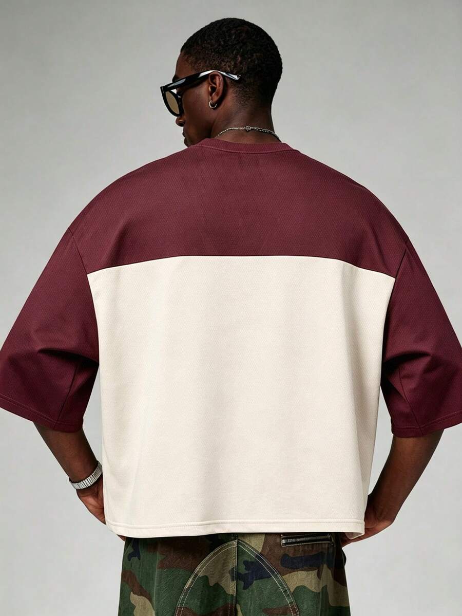 Camiseta suelta de hombro caído con estampado de letras casual para hombre