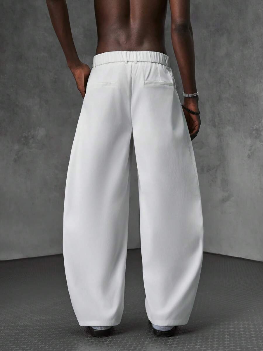 Pantalones de cintura alta y pierna ancha para hombre con frente plisado