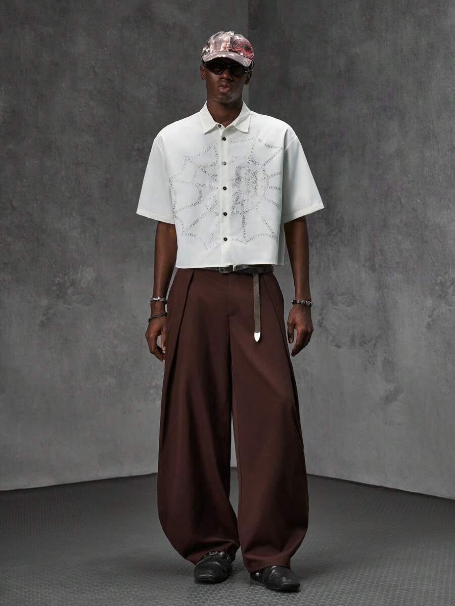 Pantalones de cintura alta y pierna ancha para hombre con frente plisado