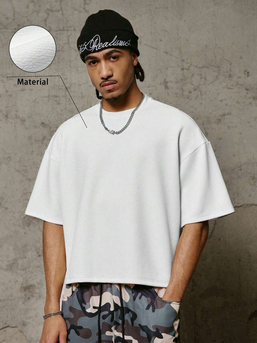 Camiseta suelta de hombro caído con estampado de letras casual para hombre