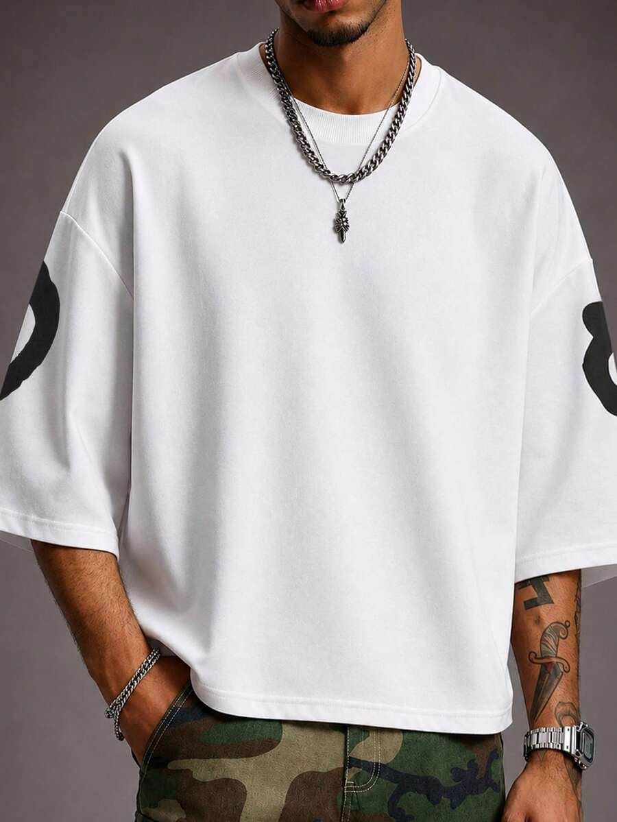 Camiseta suelta de hombro caído con estampado de letras casual para hombre