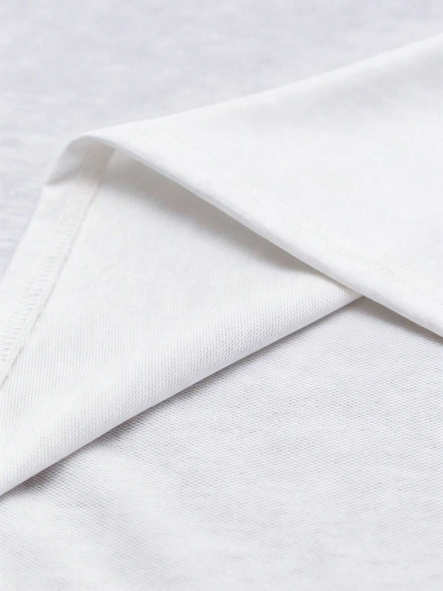 Camiseta suelta de hombro caído con estampado de letras casual para hombre