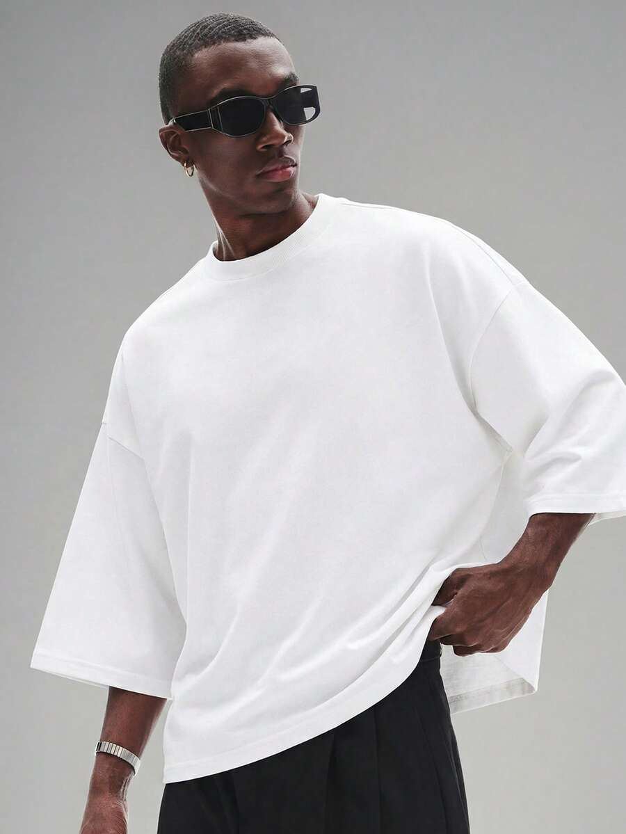 Camiseta suelta de hombro caído con estampado de letras casual para hombre