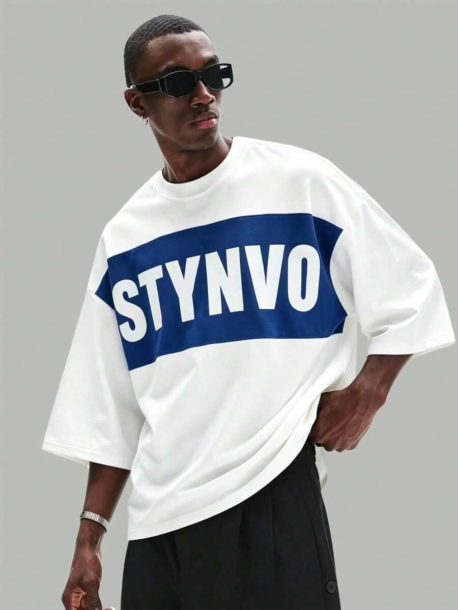 Camiseta suelta de hombro caído con estampado de letras casual para hombre