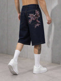 Pantalones cortos de mezclilla lavada con bordado para hombres
