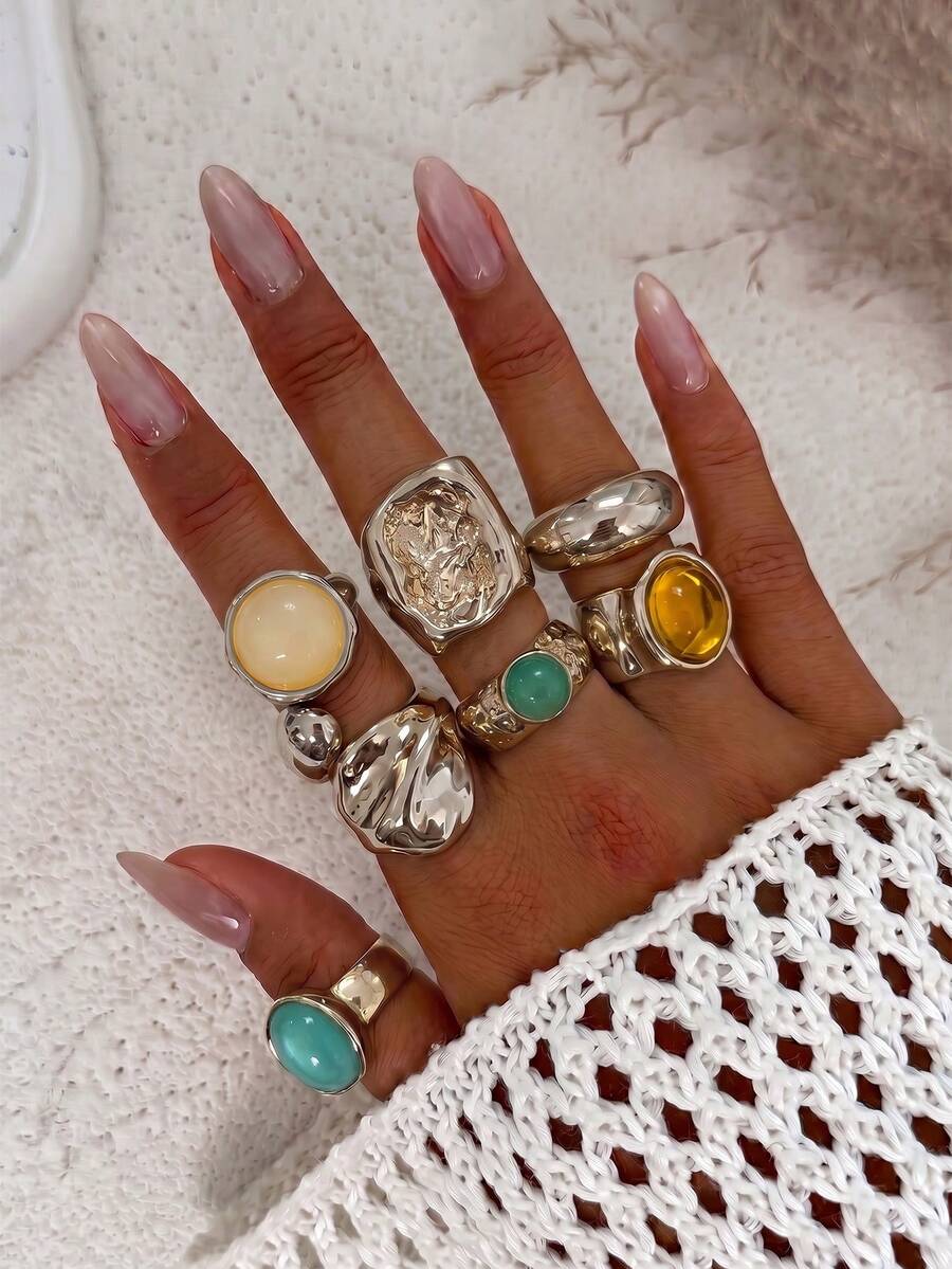 Juego de 13 anillos de metal líquido solar con textura asimétrica fluida o martillada
